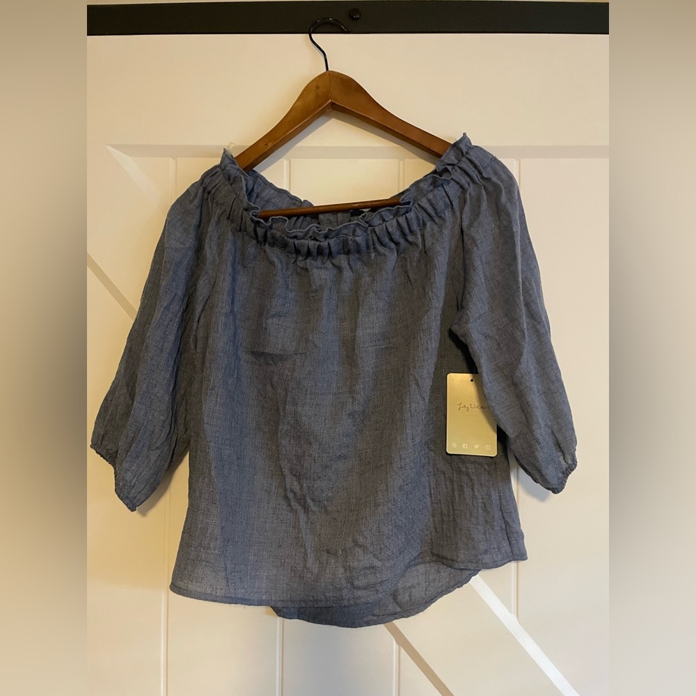 Blue shirt 80% polyester 20% Cotton